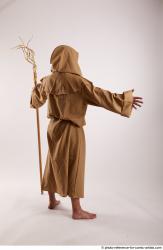 JOEL_ADAMSON STANDING POSE WITH A MAGIC STICK